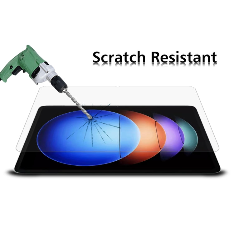 Tempered glass screen protector film on a tablet screen with drill impact test