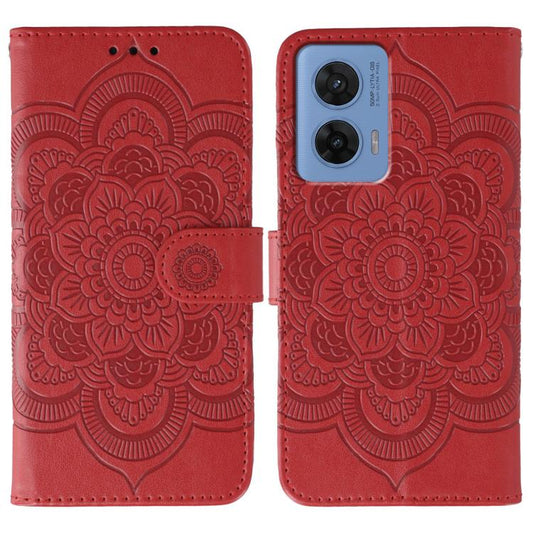 Red leather phone case with embossed sun mandala pattern and magnetic clasp