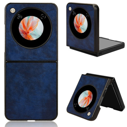 Blue litchi-texture phone back case with circular camera cutout and foldout kickstand