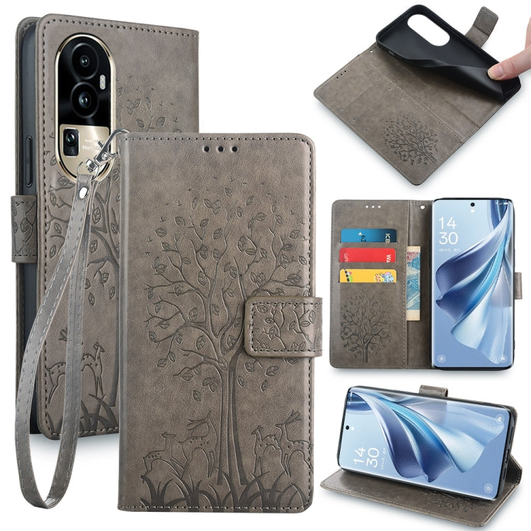 Embossed leather-look phone case with tree and deer, wrist strap, gray color