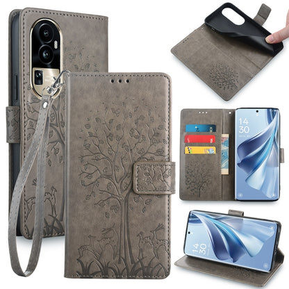 Embossed leather-look phone case with tree and deer, wrist strap, gray color