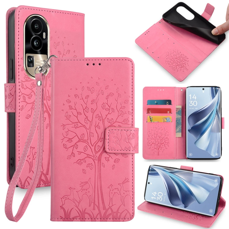 Embossed leather-look phone case with tree and deer, wrist strap, pink color