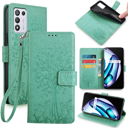 Embossed leather-look phone case with tree and deer, wrist strap, green color