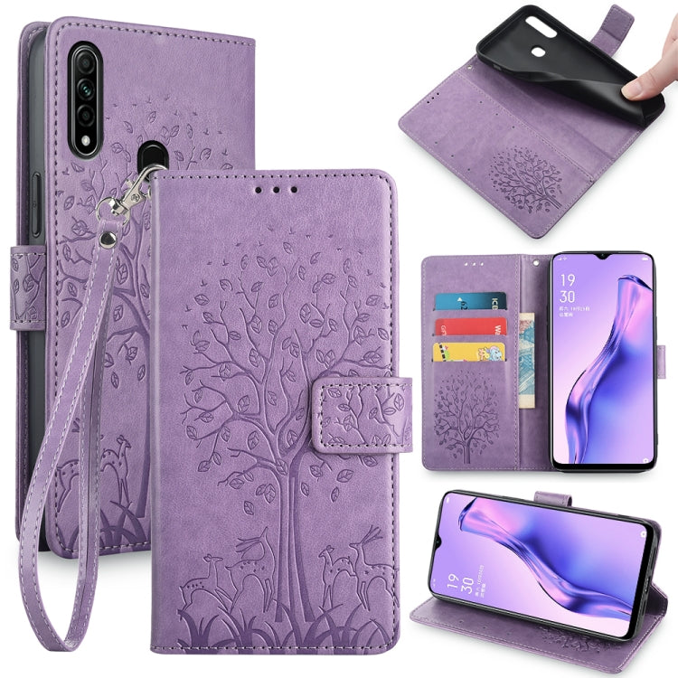 Purple embossed leather phone wallet case with tree and deer pattern, wrist strap, cutouts