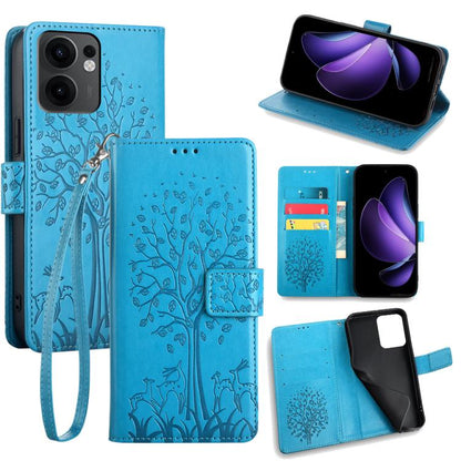 Blue embossed leather phone case with tree-and-deer pattern, folio wallet and wrist strap