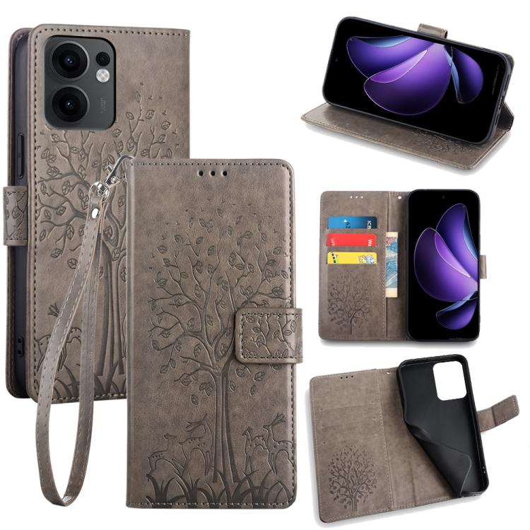 Grey embossed leather phone case with tree-and-deer pattern, folio wallet and wrist strap