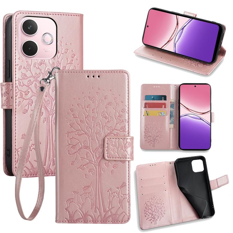 Pink embossed leather phone case with tree-and-deer pattern, folio wallet and wrist strap