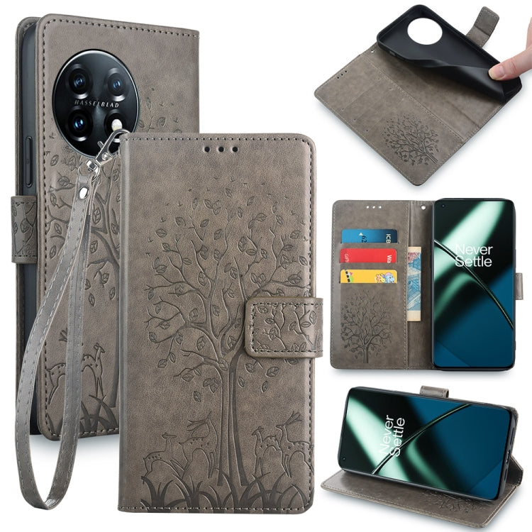 Grey tree and deer embossed leather phone case with flip cover and wrist strap