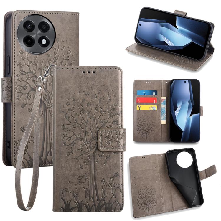 Grey embossed leather phone case with tree-deer pattern, flip cover, wrist strap, stand view