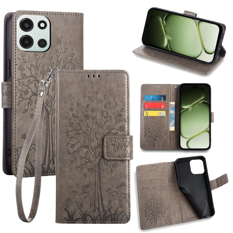 Grey embossed leather phone wallet case with deer-and-tree pattern, card slots, wrist strap