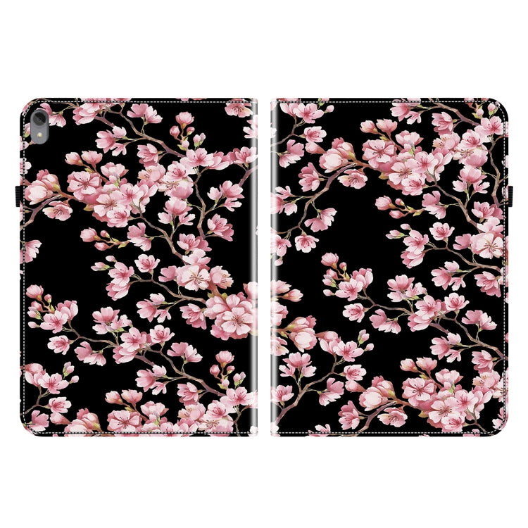Folio tablet case with black cover and pink cherry blossom pattern, front and back views