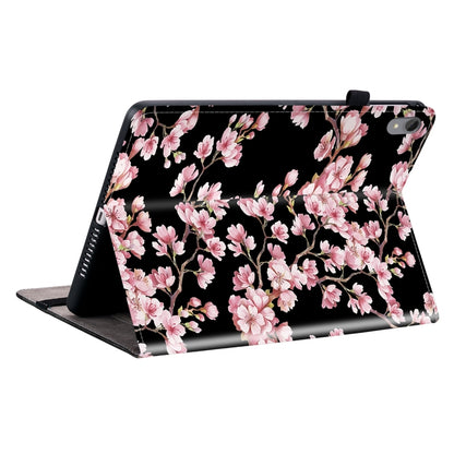 Black folio tablet case with pink cherry blossom print and angled stand