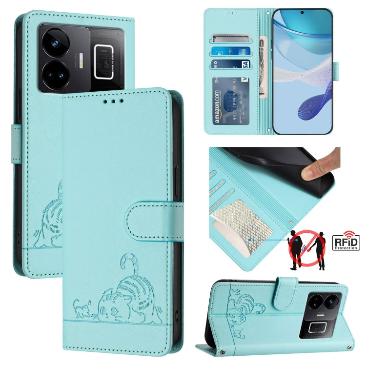 Mint green RFID leather phone case with embossed cat-and-rat pattern and lanyard strap