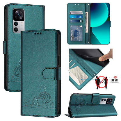 Peacock green RFID leather phone case with lanyard; embossed cat/rat pattern and card slot.
