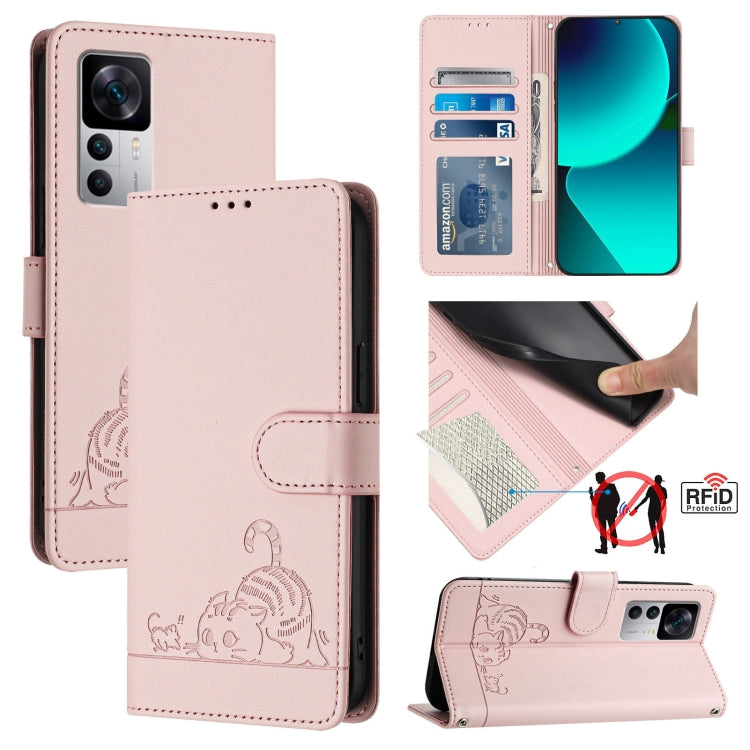 Pink RFID leather wallet phone case with lanyard; embossed cat/rat pattern and card slot.