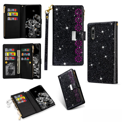 Black glitter flip wallet phone case with zipper, card slots, and lanyard holder