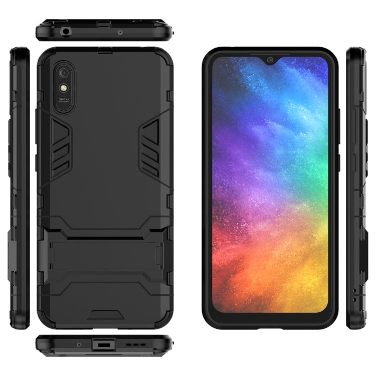 Shockproof phone case with stand, black with ports and button cutouts