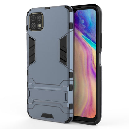 Light blue rugged shockproof phone case with holder, side vents and camera cutouts
