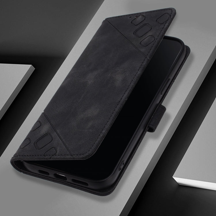 Black embossed leather folio phone case with front flap and side port cutouts