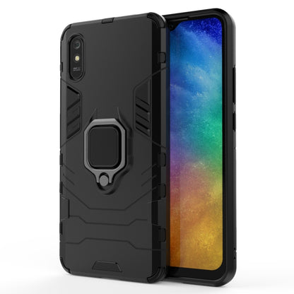 Black protective phone case with raised corners and magnetic ring holder
