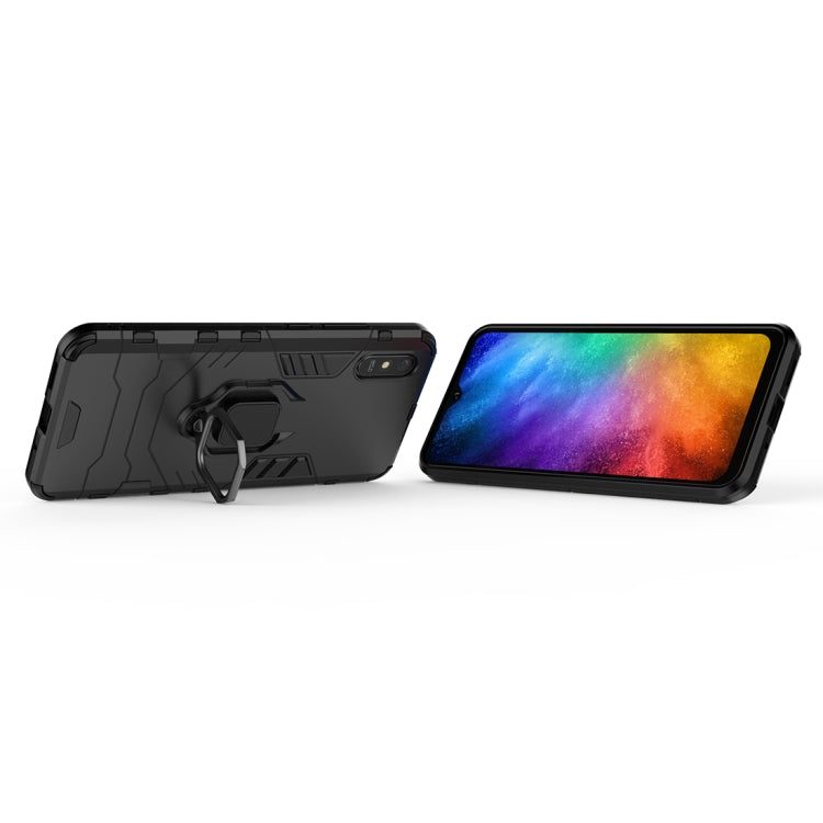 Black protective phone case with kickstand-style magnetic ring holder