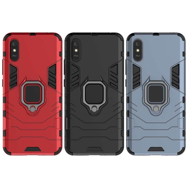 Set of protective phone cases in red, black, and gray-blue with magnetic ring holders