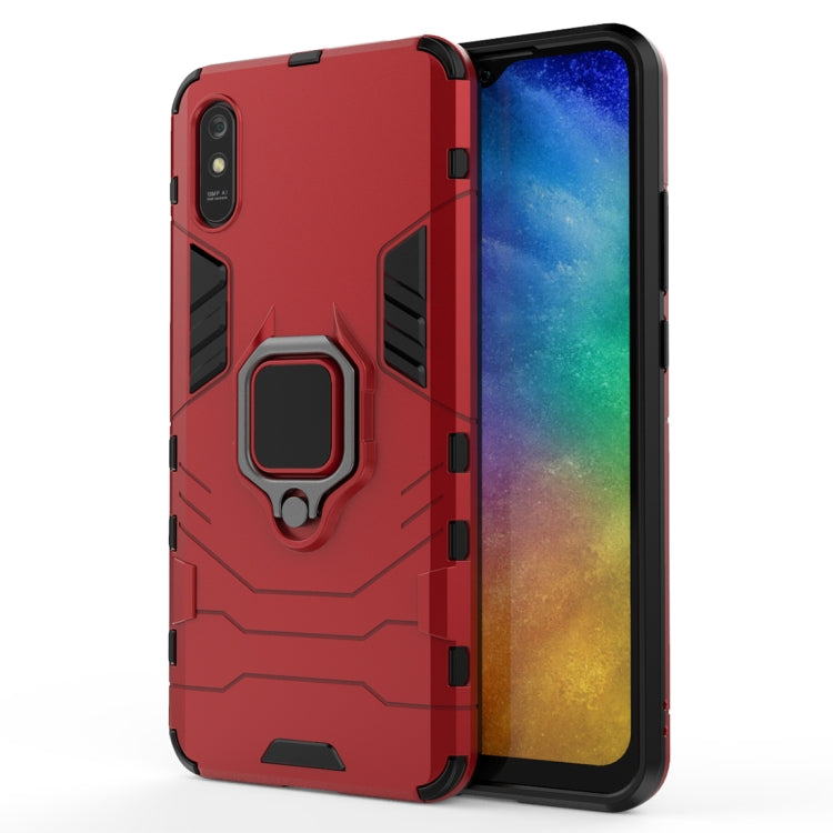 Red protective phone case with raised corners and magnetic ring holder