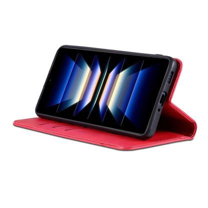 Red flip phone case with stand mode for viewing, leather outer shell.