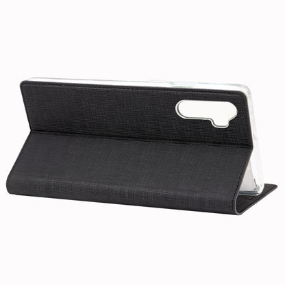 Black magnetic flip phone case with horizontal stand and camera opening