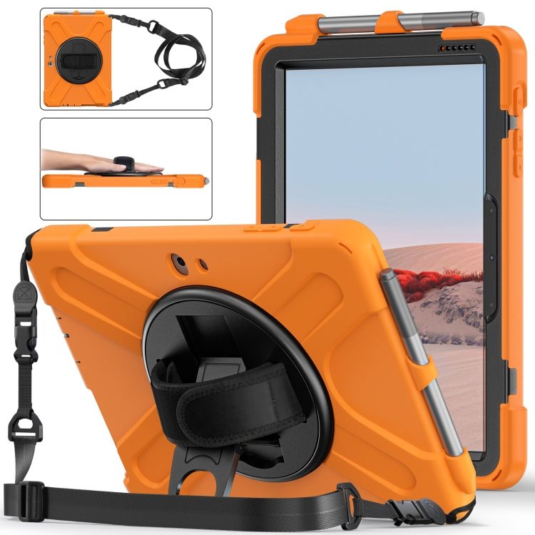 Orange rugged tablet case with adjustable shoulder strap, hand strap, and round kickstand