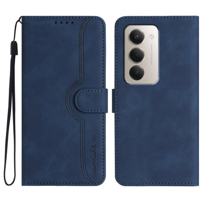 Blue heart-pattern faux leather flip phone case with wrist strap and camera cutout.