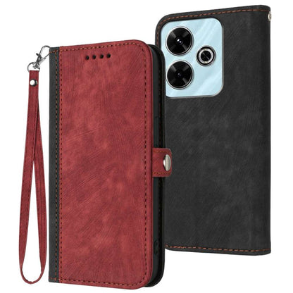 Red leather double-fold phone case with wrist strap and stitched edges; black back cover visible