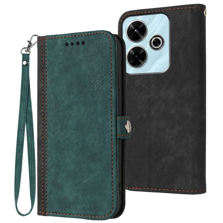 Dark green leather double-fold phone case with wrist strap and stitched edges; black back cover visible