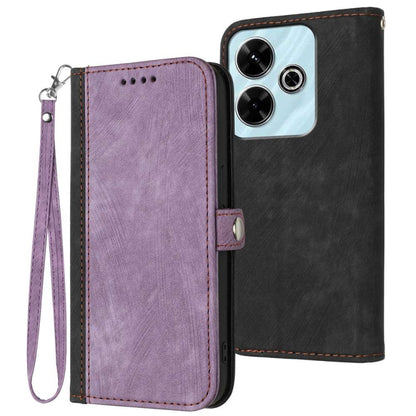 Purple leather double-fold phone case with wrist strap and stitched edges; black back cover visible