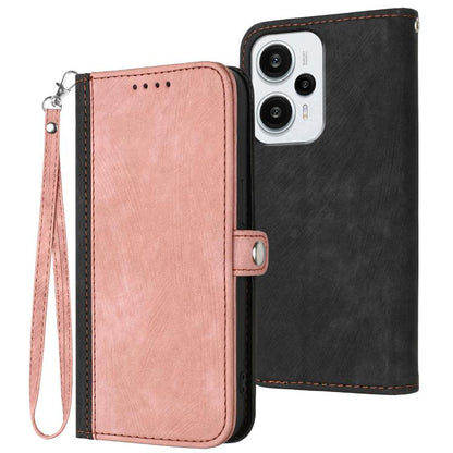 Leather flip phone case with side buckle and wrist strap, pink front, stitched edges