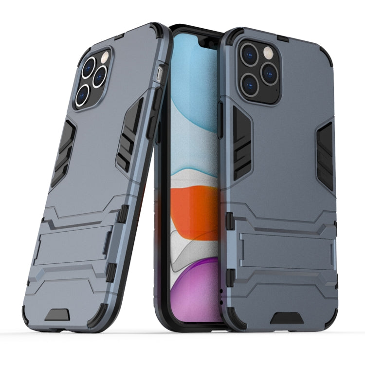 Shockproof protective phone case in navy blue with raised edges and camera cutouts