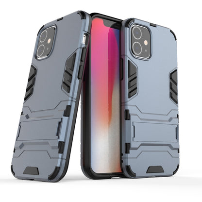Shockproof protective phone case in light navy blue with raised edges and camera openings