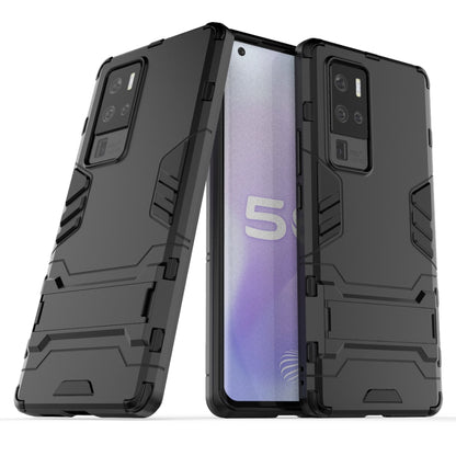 Shockproof protective phone case with built-in holder, dark gray, rugged bumper design.
