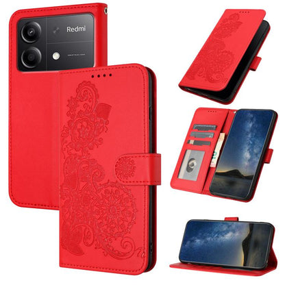 Red Datura flower embossed flip leather phone case with card slots and magnetic flap