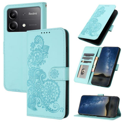 Light blue Datura flower embossed flip leather phone case with card slots and magnetic flap