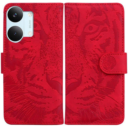 Red tiger-embossed leather wallet phone case with foldover flap and button strap