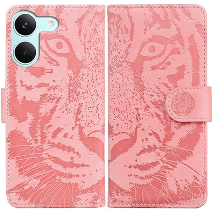 Pink tiger-emboss flip phone case with circular clasp and card slot on wallet-style cover.