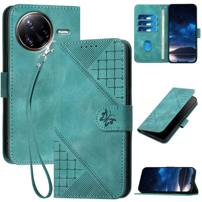 Teal leather phone case with embossed grid-butterfly pattern and wrist lanyard.