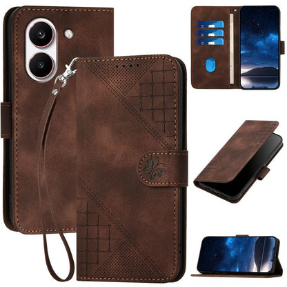 Brown leather phone case with embossed grid butterfly pattern and wrist lanyard strap