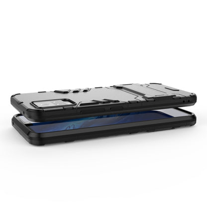 Black rugged shockproof phone case with kickstand base and thick bumper edges