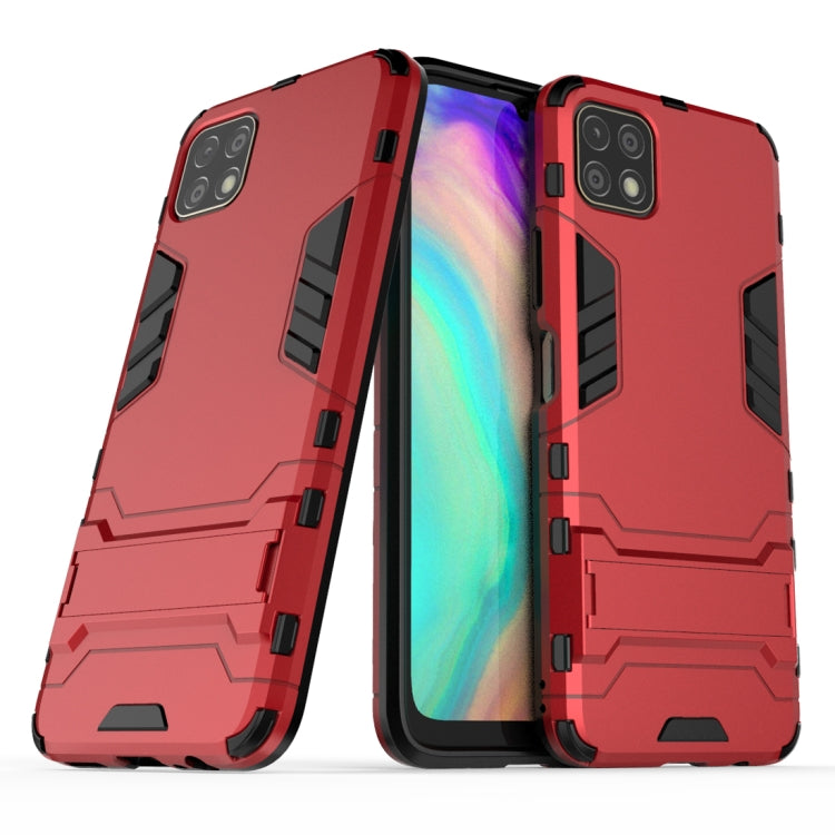 Shockproof phone case with rugged armor design, dual-layer look, camera cutouts, red.