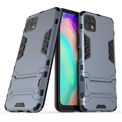 Shockproof phone case with rugged armor design, dual-layer look, camera cutouts, light dark gray-blue.