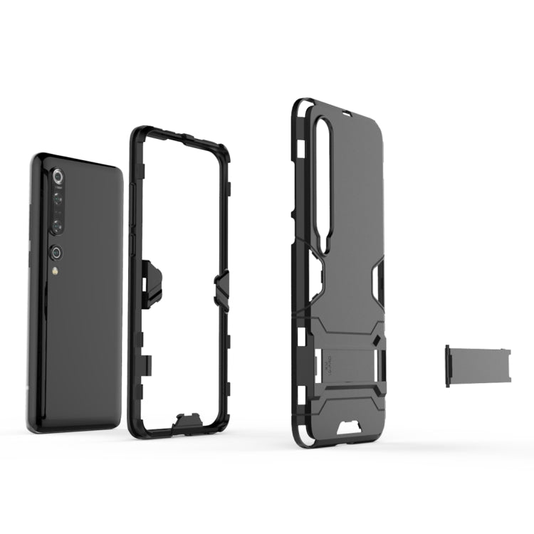 Rugged protective phone case in black and gray with open sides and visible cutouts