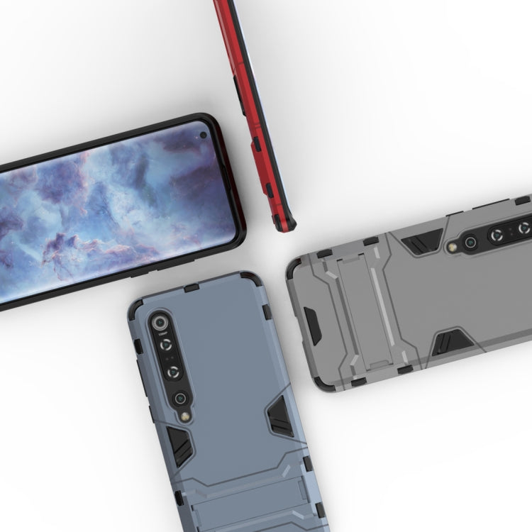 Close-up of rugged case showing camera area and textured back with red frame accents
