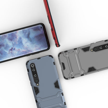 Close-up of rugged case showing camera area and textured back with red frame accents